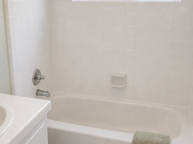 Same Clayton Valley tile tub surround reglazed to clean soft white, Concord, CA